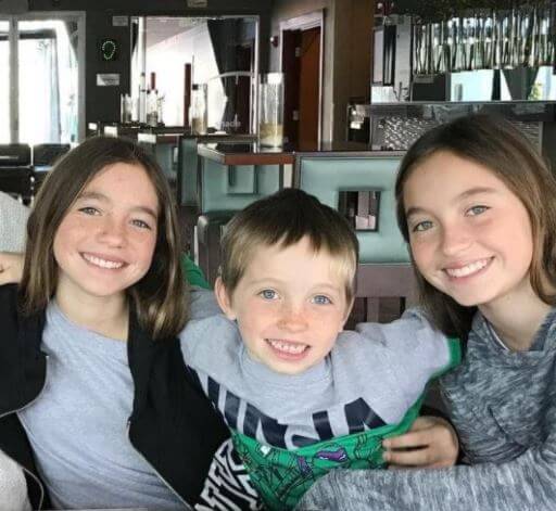 Matteo Joel Nash with his twin sisters Lola and Bella.